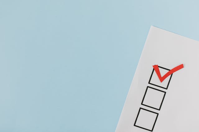 red-checkmark-in-a-box-on-a-piece-of-paper red-checkmark-in-a-box-on-a-piece-of-paper